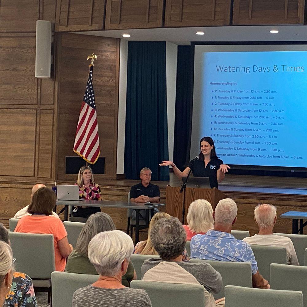 Image of Conservation Specialist giving a presentation.